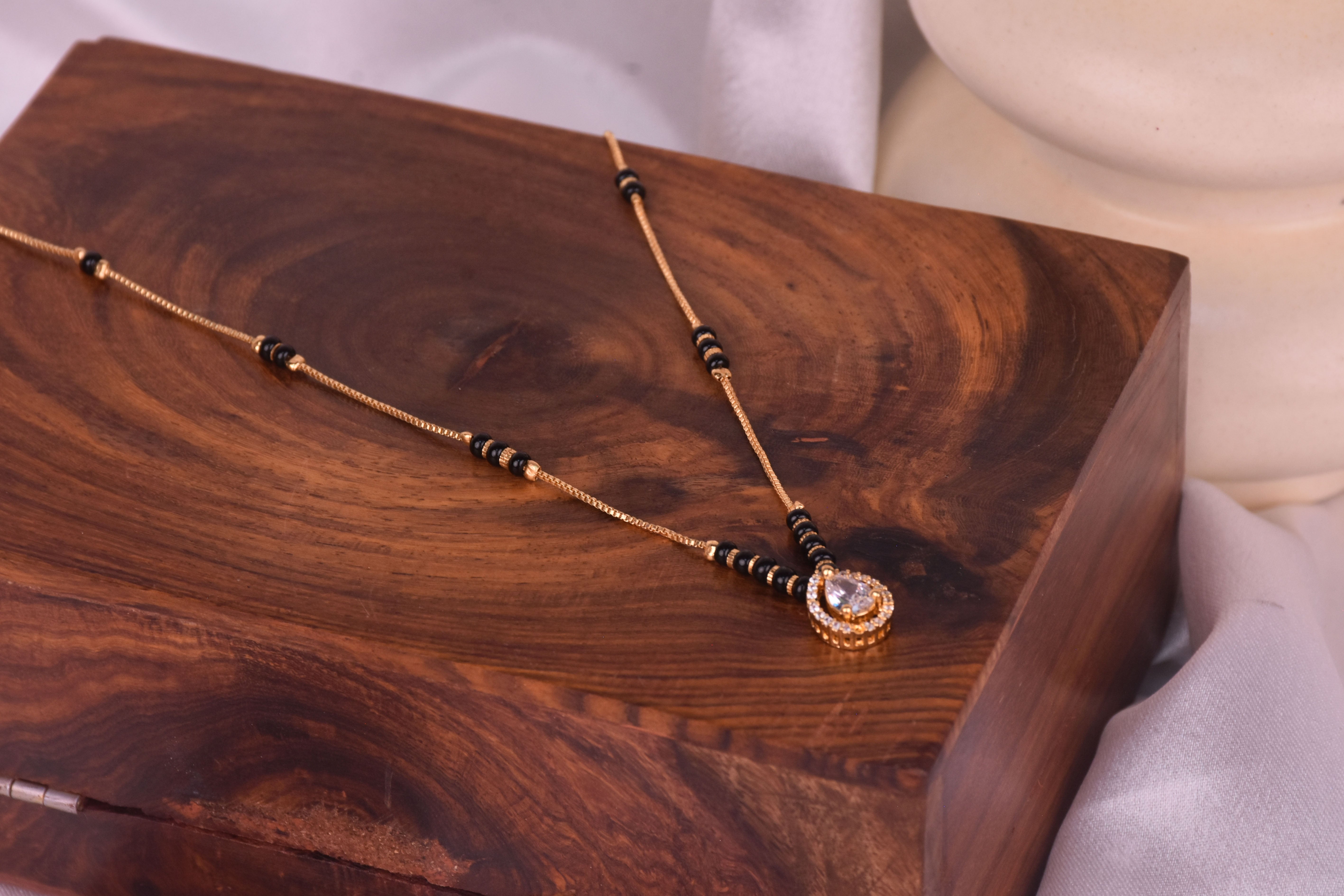 Uniquely Crafted Mangalsutra with CZ Stone & Black Beads