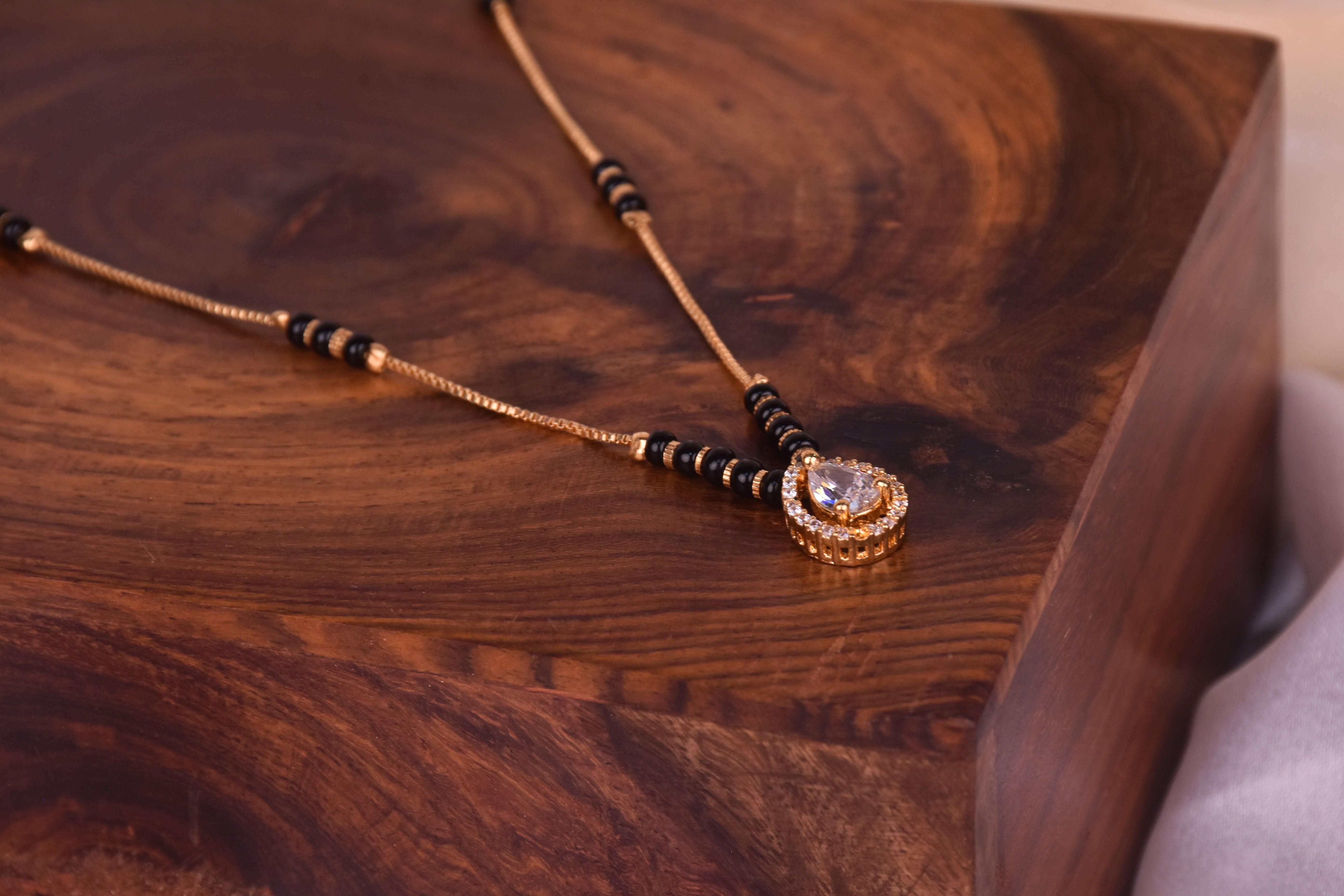 Uniquely Crafted Mangalsutra with CZ Stone & Black Beads