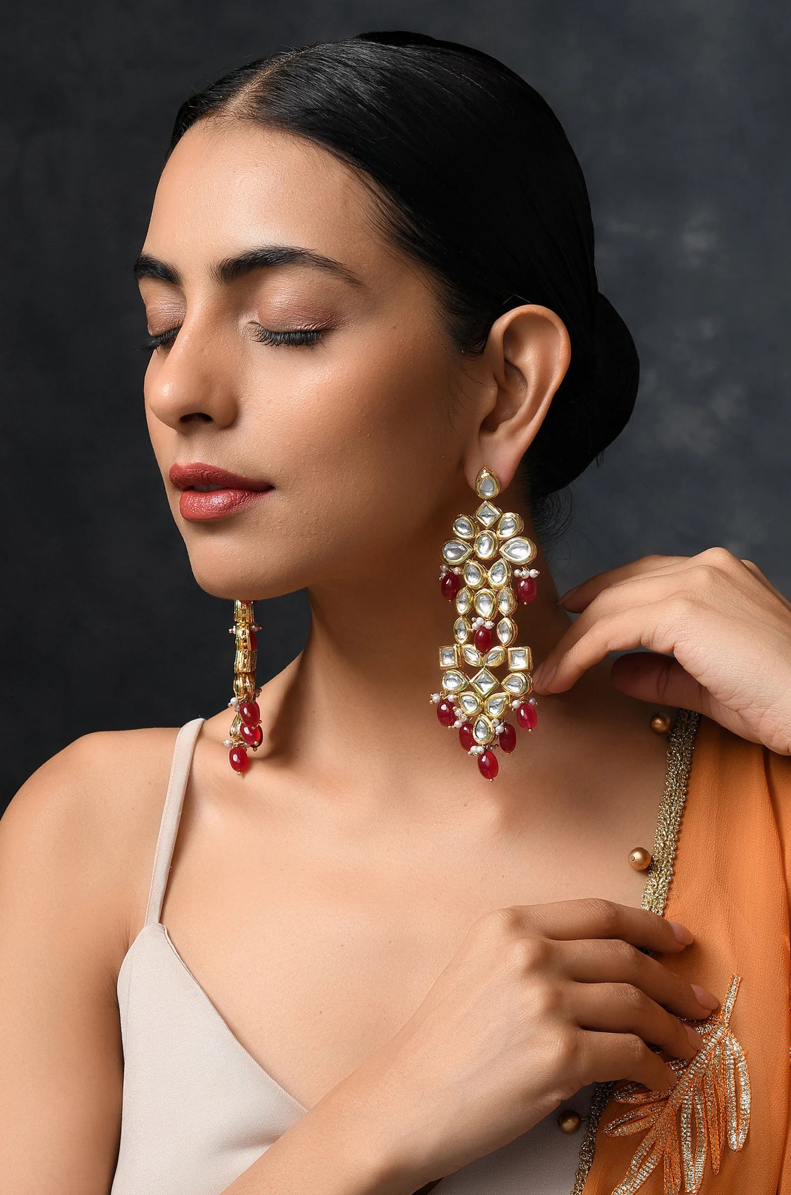 "Classic Kundan Earrings with Red and Golden Stones for Every Special Moment"