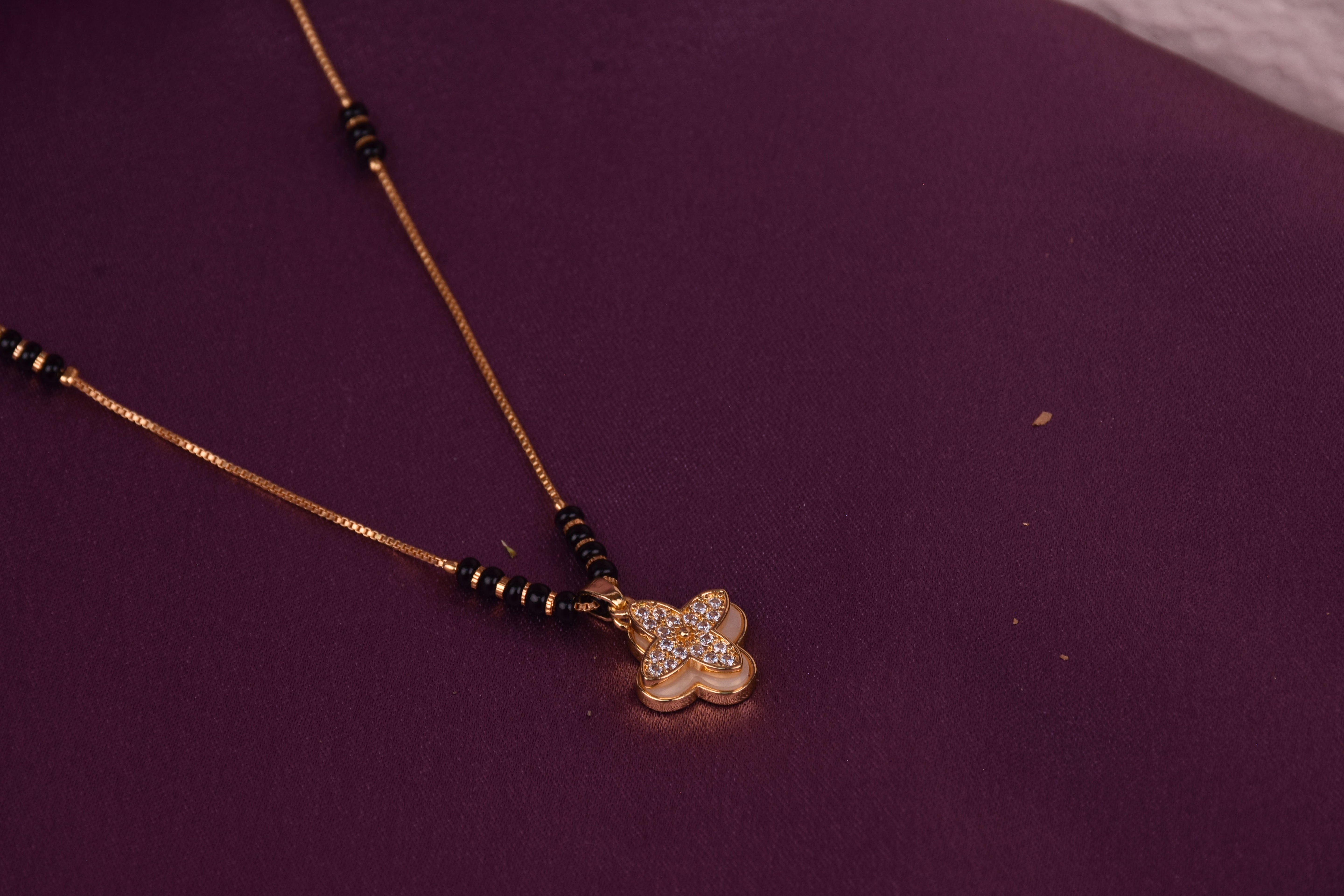 Uniquely Crafted Mangalsutra with CZ Stone & Black Beads