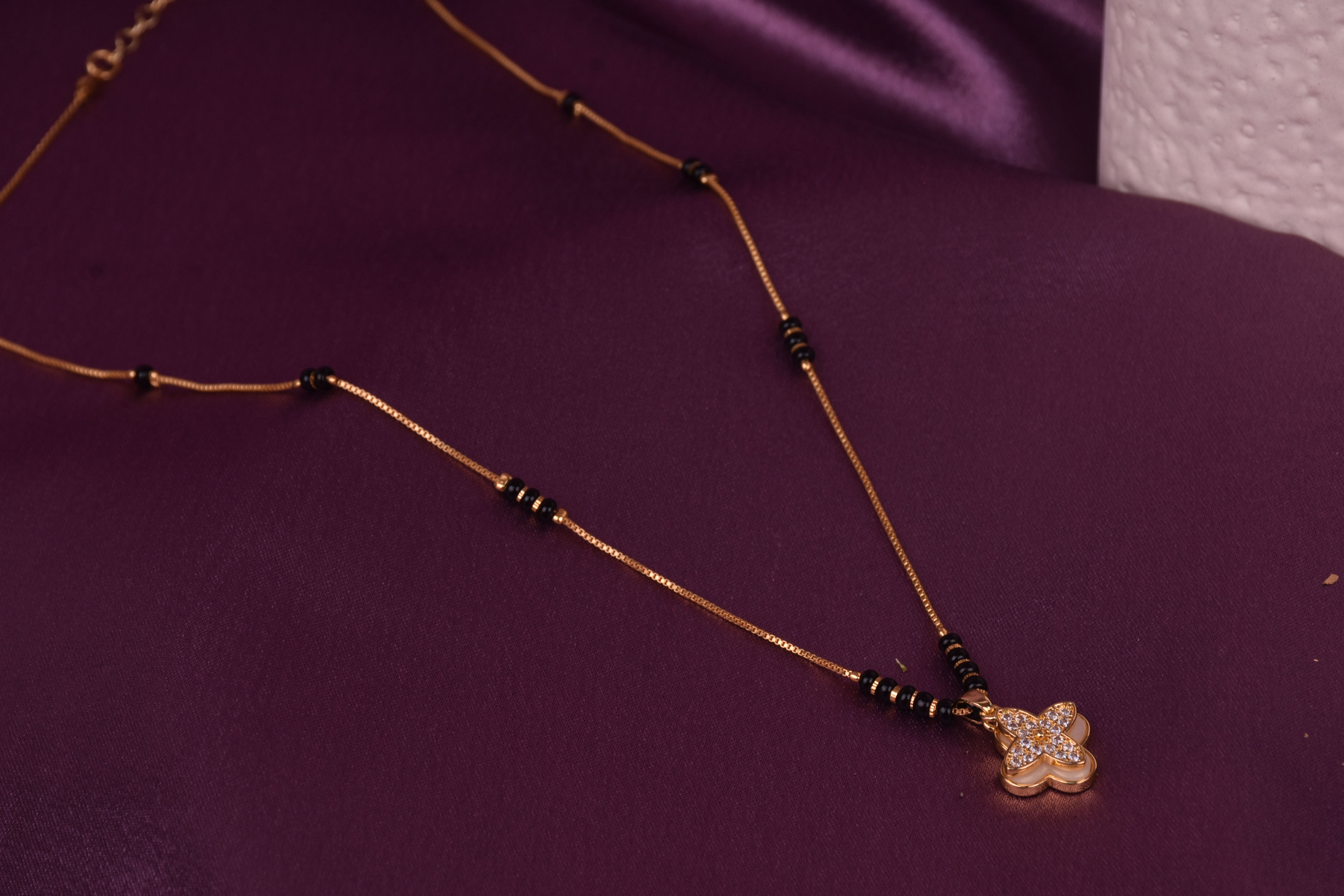 Uniquely Crafted Mangalsutra with CZ Stone & Black Beads