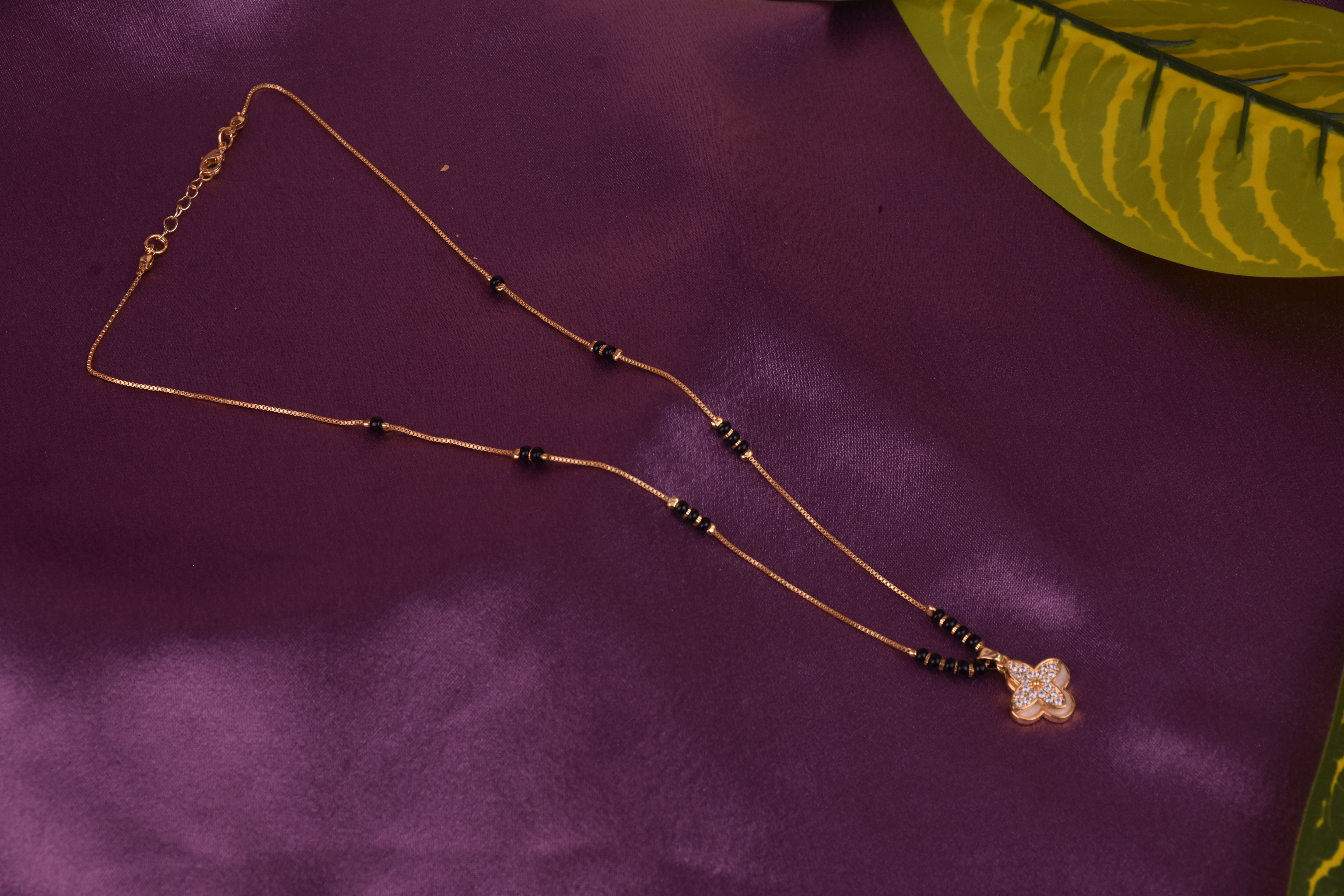 Uniquely Crafted Mangalsutra with CZ Stone & Black Beads